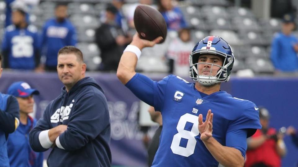 Giants head coach Joe Judge watches as Giants quarterback Daniel Jones warms up before the game as the Carolina Panthers faced the New York Giants at MetLife Stadium