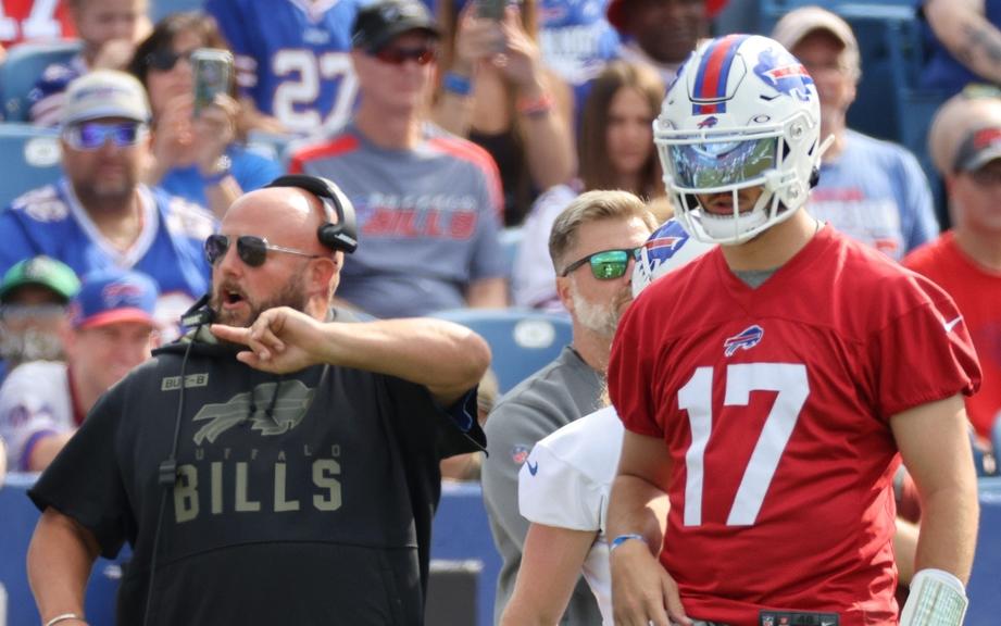 Josh Allen with offensive coordinator Brian Daboll during a training camp practice.