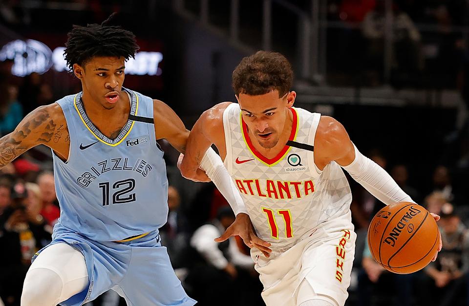 Under-25 point guards Ja Morant and Trae Young secured two of the four starting backcourt spots in the 2022 NBA All-Star Game. (Kevin C. Cox/Getty Images)