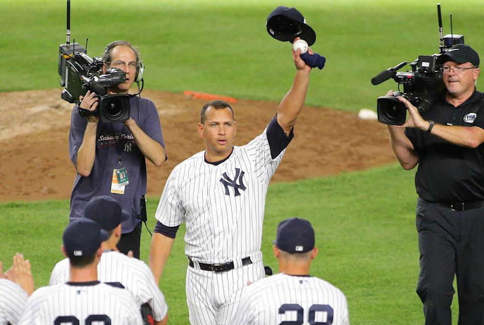 Alex Rodriguez waves to fans after playing his final game as a Yankee in 2016.