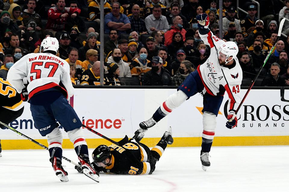 Boston Bruins left wing Anton Blidh lays on the ice after a hit from Washington Capitals right wing Tom Wilson during the first period at the TD Garden.