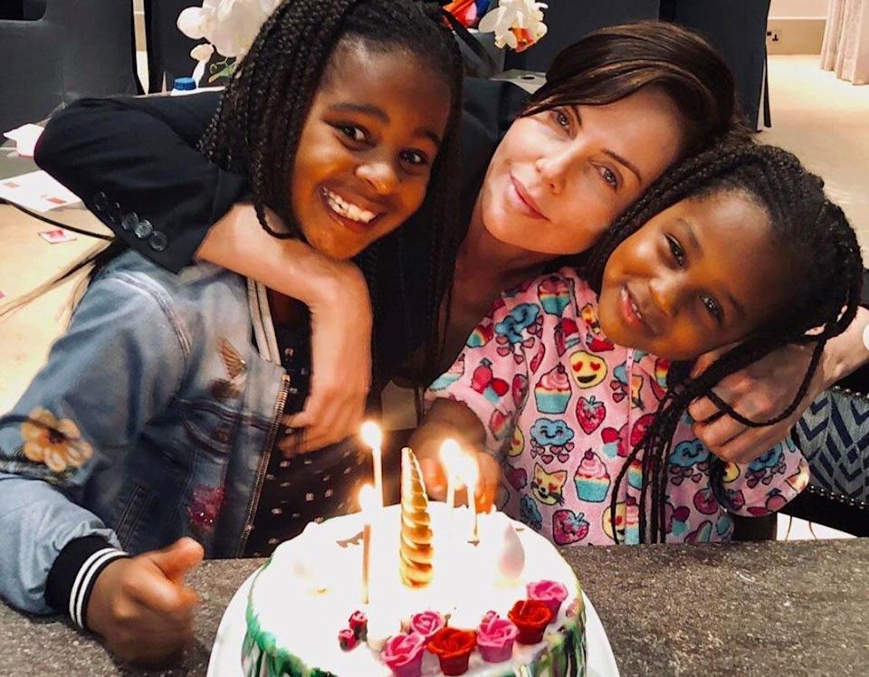 Charlize Theron and her daughters