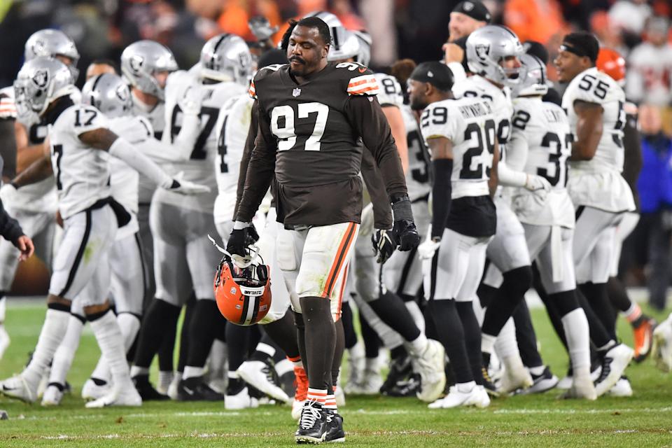 Cleveland Browns defensive tackle Malik Jackson (97) walks off the field as the Las Vegas Raiders celebrate a win in an NFL football game, Monday, Dec. 20, 2021, in Cleveland. (AP Photo/David Richard)