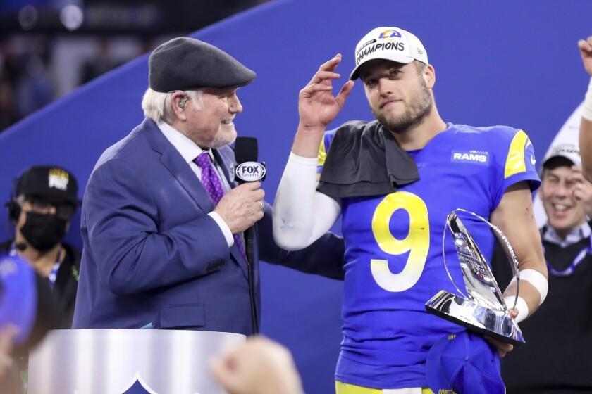 Rams quarterback Matthew Stafford (9) talks with Terry Bradshaw after defeating the San Francisco 49ers