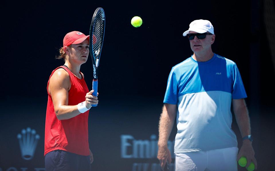 Ashleigh Barty, pictured to the left of the coach Craig Tyzzer, on Saturday won the Australian Open - Emma Raducanu’s US Open victory down to grand slam’s unique balls, claims Ashleigh Barty’s coach - GETTY IMAGES