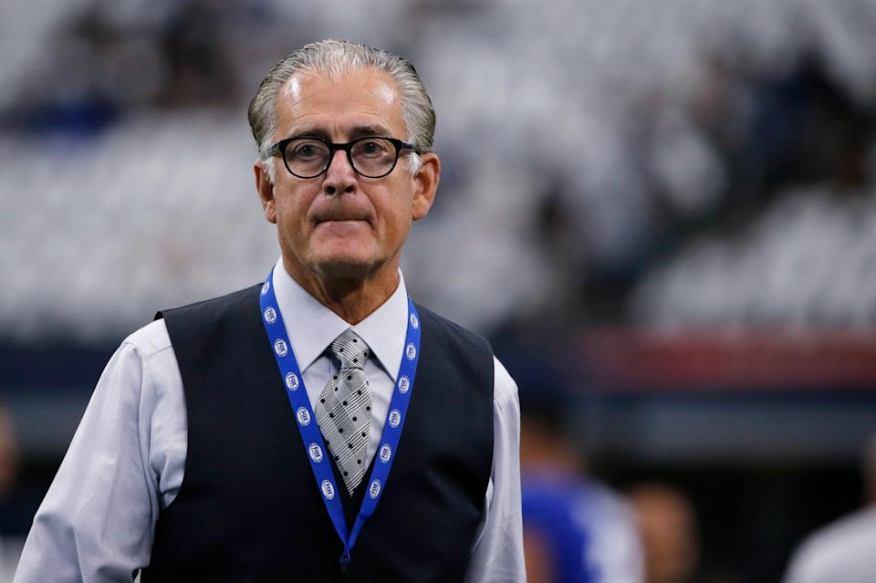 Mike Pereira walks across the field before a game in September 2019.