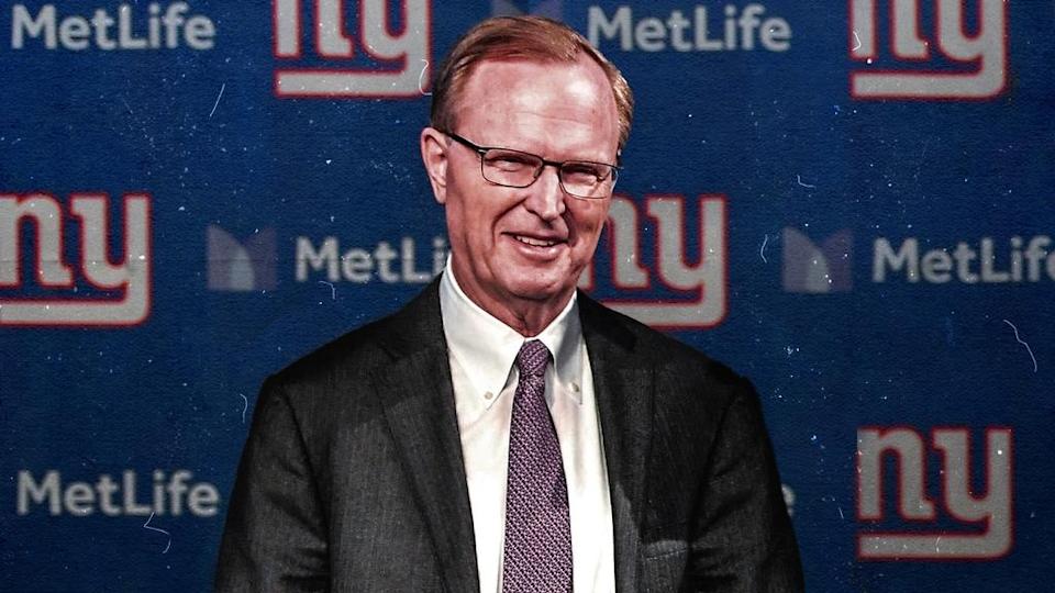 John Mara treated image, in suit in front of Giants logo background