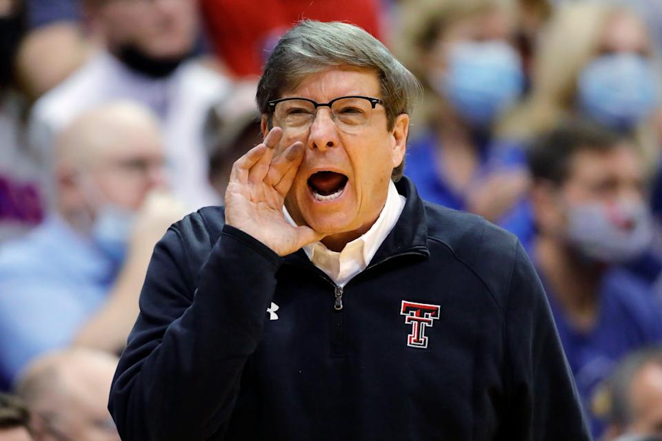Texas Tech head coach Mark Adams communicates with his players during the second half of an NCAA college basketball game against Kansas on Monday, Jan. 24, 2022, in Lawrence, Kan. (AP Photo/Colin E. Braley) ORG XMIT: KSCB113