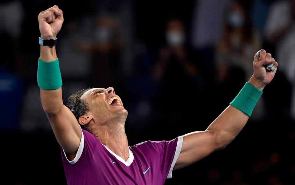 Rafael Nadal of Spain celebrates his win over Daniil Medvedev of Russia in the men's singles final at the Australian Open tennis championships in Melbourne - 'A Herculean final': How the world reacted to Rafael Nadal's record-breaking Australian Open win - AP