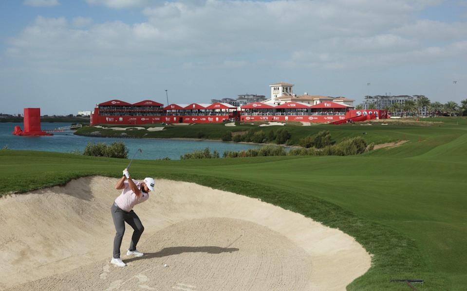 Tyrrell Hatton of England plays a bunker shot for his second shot on the eighteenth hole during the Third Round of the Abu Dhabi HSBC Championship at Yas Links Golf Course on January 22, 2022 - GETTY IMAGES