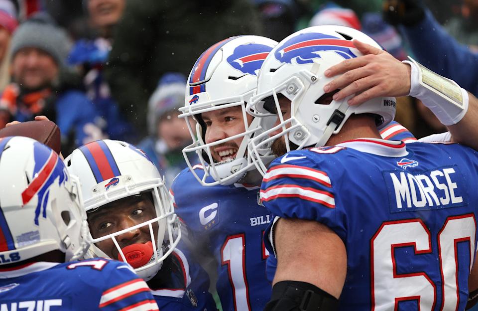 Josh Allen celebrates one of his two rushing touchdowns in a 29-15 win over Atlanta.