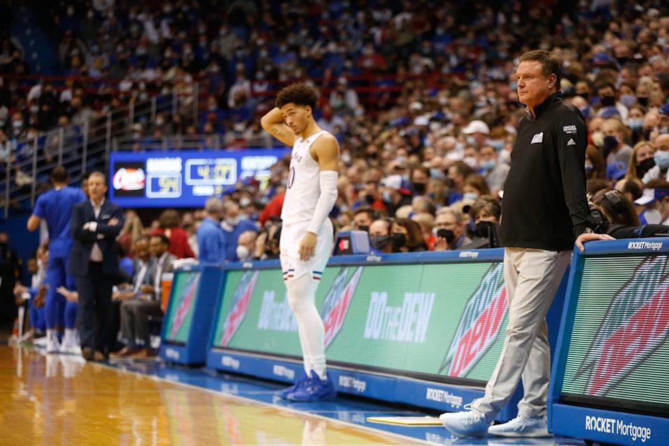 Kansas coach Bill Self casually watches the last four minutes of Saturday's game against Kentucky inside Allen Fieldhouse.