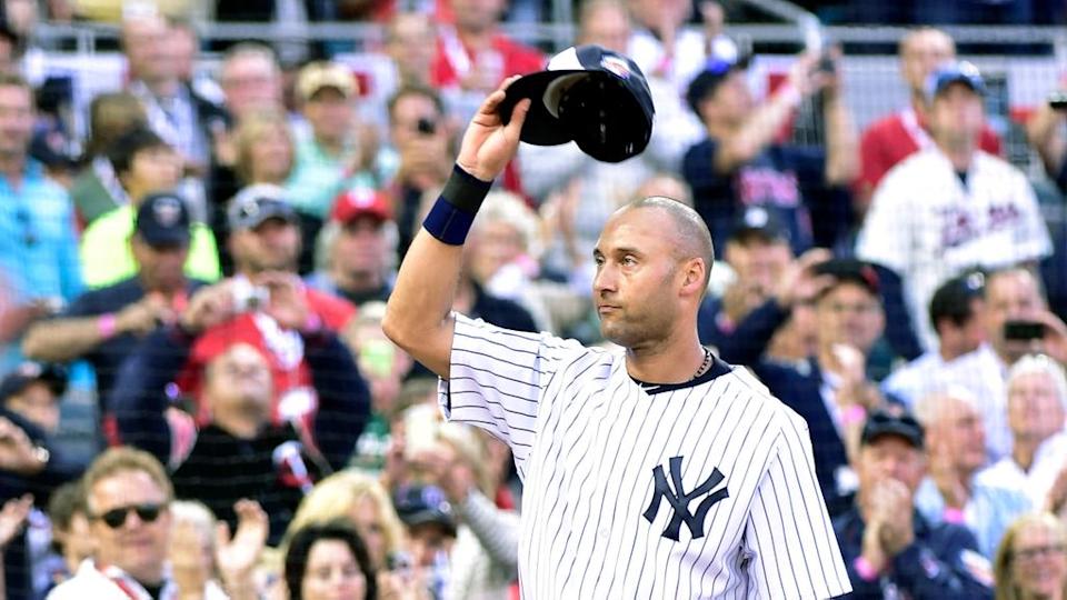 American League infielder Derek Jeter (2) of the New York Yankees waves to the crowd as he is replaced in the fourth inning during the 2014 MLB All Star Game at Target Field.