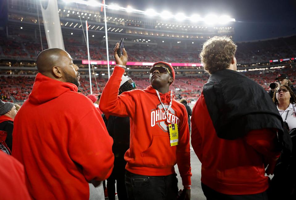 Omari Abor, a 2022 defensive end recruit from Duncanville, Texas, takes in the sights of Ohio Stadium prior to the NCAA football game against the Penn State Nittany Lions in Columbus on Sunday, Oct. 31, 2021. 