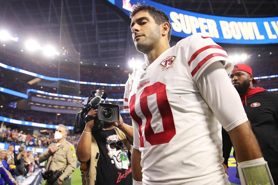 Jimmy Garoppolo #10 of the San Francisco 49ers walks off the field after being defeated by the Los Angeles Rams in the NFC Championship Game at SoFi Stadium on January 30, 2022 in Inglewood, California.