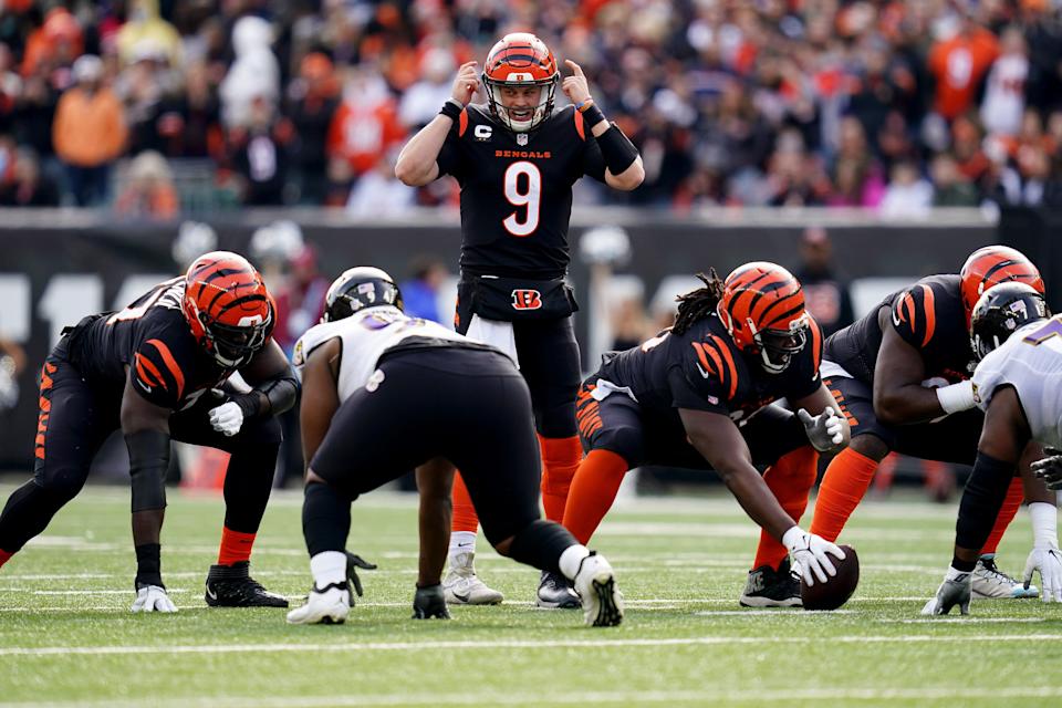 Cincinnati Bengals quarterback Joe Burrow (9) calls a play at the line of scrimmage in the first quarter during a Week 16 NFL game against the Baltimore Ravens, Sunday, Dec. 26, 2021, at Paul Brown Stadium in Cincinnati.