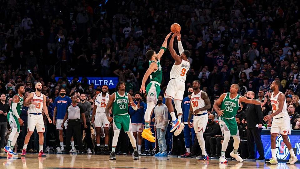 RJ Barrett buzzer-beater wide angle white uniform teammates watching