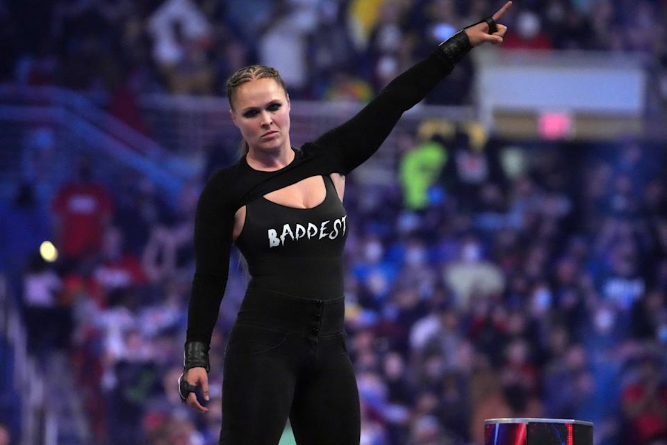 Jan 29, 2022; St. Louis, MO, USA; Ronda Rousey celebrates after winning the women’s Royal Rumble match during the Royal Rumble at The Dome at America's Center. Mandatory Credit: Joe Camporeale-USA TODAY Sports