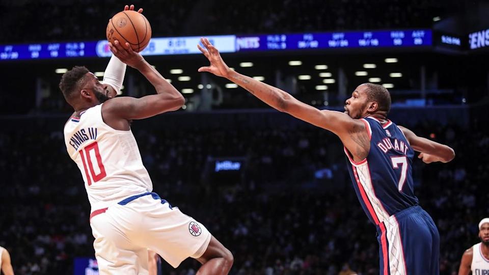 Nets Kevin Durant guarding shot against Clippers