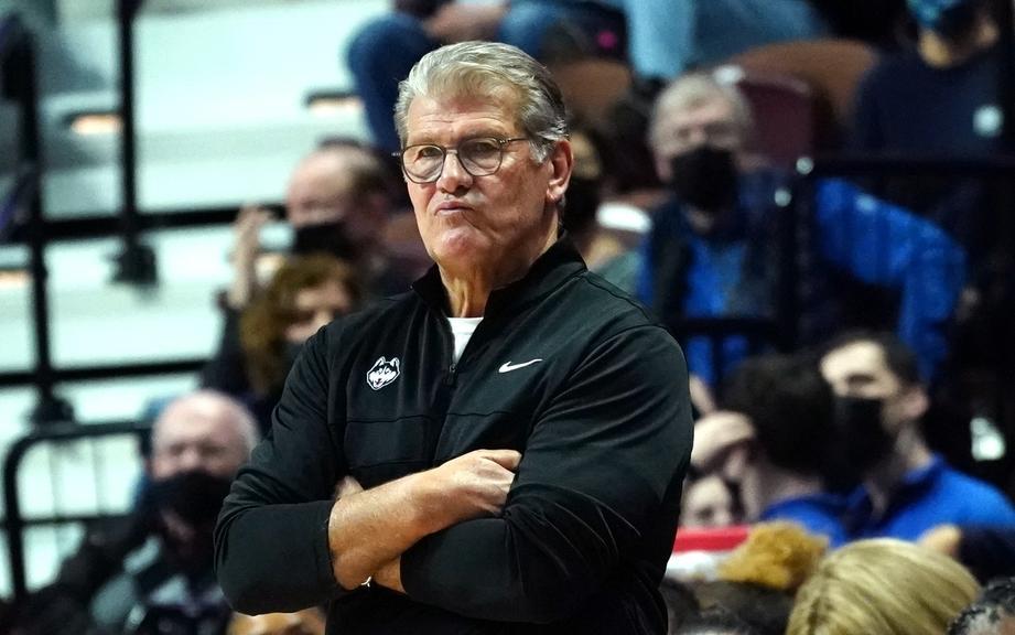 Geno Auriemma arms crossed sideline cropped