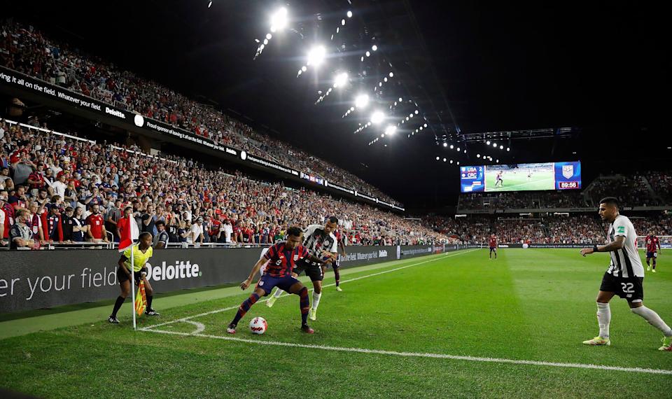 United States' midfielder Weston McKennie (8) holds off Costa Rica's midfielder Randall Leal (12) in the second half in their World Cup qualifier at Lower.com Field in Columbus, Ohio on October 13, 2021. 