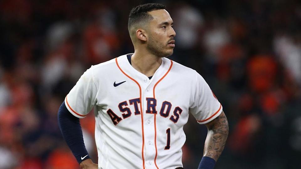 Houston Astros shortstop Carlos Correa (1) reacts after striking out against the Atlanta Braves during the sixth inning in game six of the 2021 World Series at Minute Maid Park.