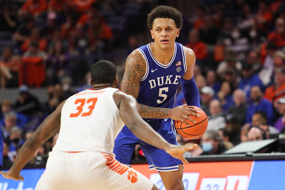 Duke forward Paolo Banchero controls the ball as Clemson forward Naz Bohannon defends on Feb. 10, 2022. (Dawson Powers/USA TODAY Sports)