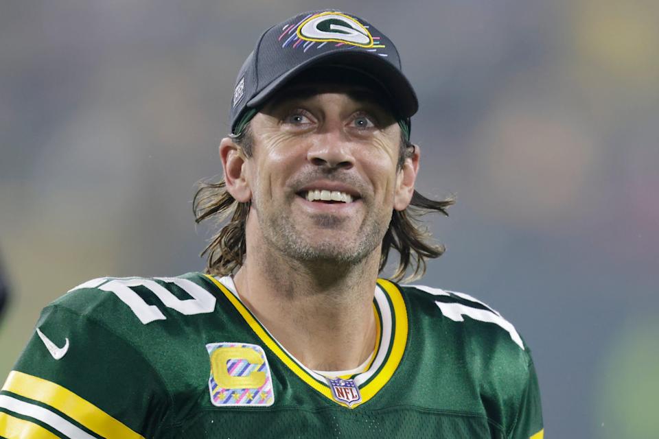 Green Bay Packers' Aaron Rodgers smiles as he leaves the field after an NFL football game against the Pittsburgh Steelers Sunday, Oct. 3, 2021, in Green Bay, Wis.