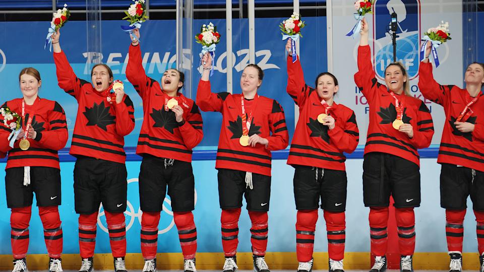 BEIJING, CHINA - FEBRUARY 17: Gold medal winners Team Canada celebrate after defeating Team United States in the Womenâ€™s Ice Hockey Gold Medal match between Team Canada and Team United States on Day 13 of the Beijing 2022 Winter Olympic Games at Wukesong Sports Centre on February 17, 2022 in Beijing, China. (Photo by Bruce Bennett/Getty Images)