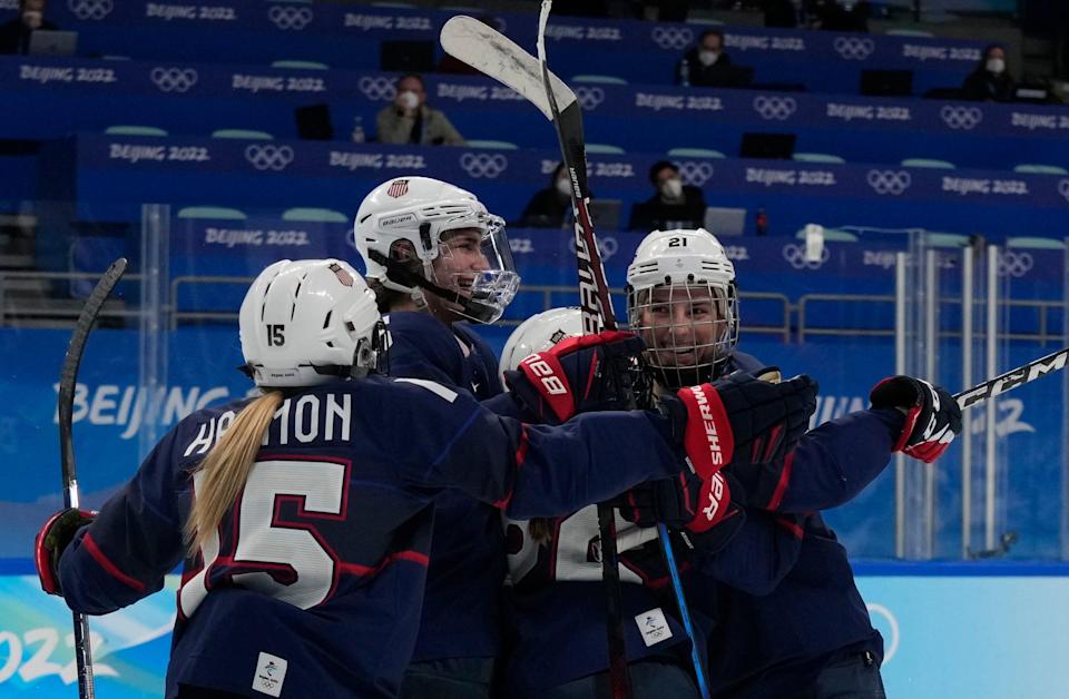 U.S. forward Hilary Knight (21) is congratulated after scoring against Finland during the second period.