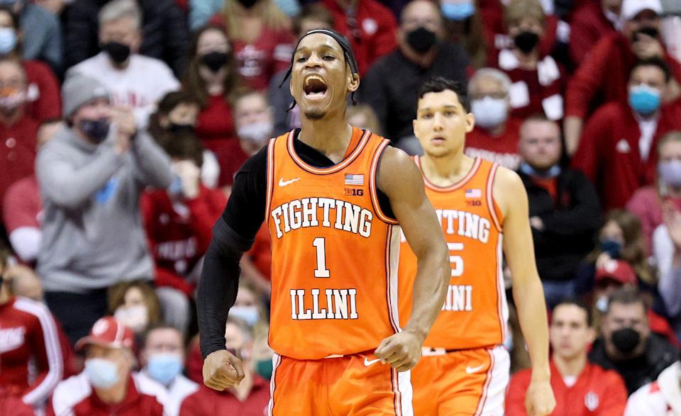 Trent Frazier of the Illinois Fighting Illini celebrates after making a basket against the Indiana Hoosiers at Simon Skjodt Assembly Hall.