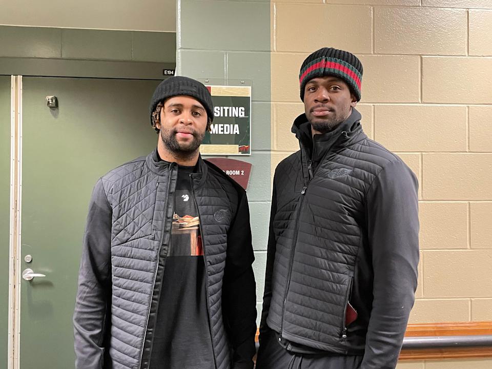 Gemel Smith, left, and Givani Smith are brothers and teammates with the Detroit Red Wings, Feb. 14, 2022 in St. Paul, Minn.