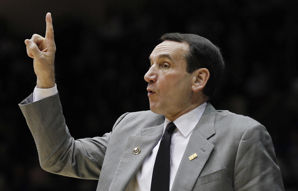 Duke coach Mike Krzyzewski directs his team against Presbyterian during the second half of an NCAA college basketball game in Durham, N.C., Saturday, Nov. 12, 2011. Duke won 96-55. Krzyzewski tied Bob Knight atop the Division I men's career wins list with 902 victories. (AP Photo/Gerry Broome)