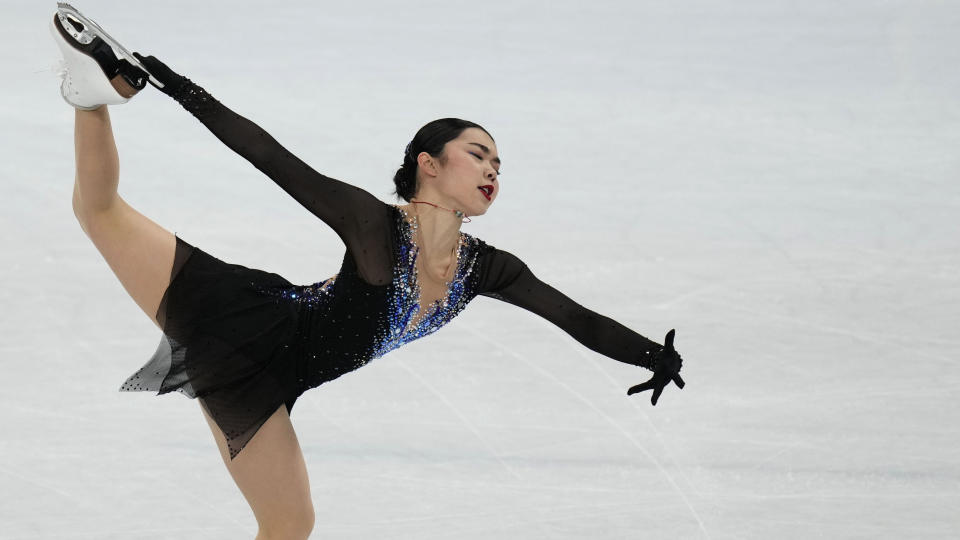 Karen Chen, of the United States, competes in the women's short program during the figure skating at the 2022 Winter Olympics, Tuesday, Feb. 15, 2022, in Beijing. (AP Photo/Bernat Armangue)