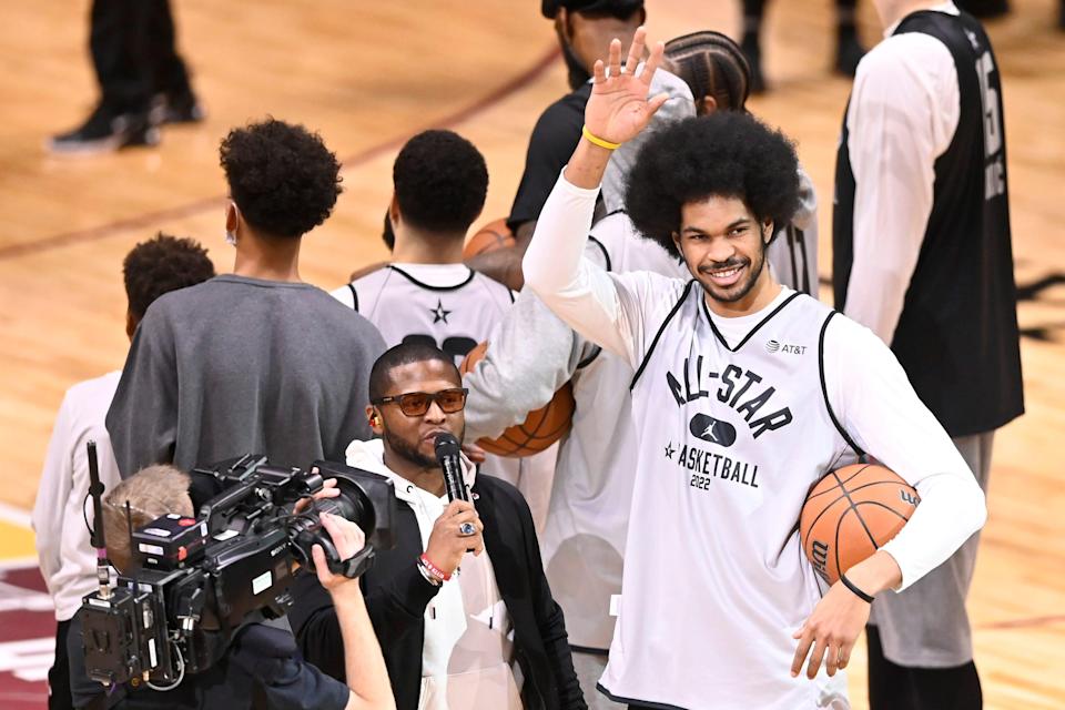 Cavaliers center Jarrett Allen waves to fans during the NBA All-Star practice, Feb. 19, 2022, at Wolstein Center in Cleveland.