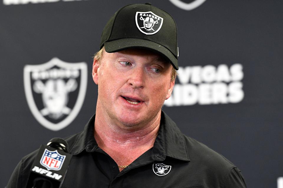 FILE - Las Vegas Raiders head coach Jon Gruden speaks with the media following an NFL football game against the Pittsburgh Steelers in Pittsburgh on Sept. 19, 2021. The former Raiders coach has sued commissioner Roger Goodell and the NFL, alleging that a &quot;malicious and orchestrated campaign&quot; was used to destroy his career by leaking old offensive emails from him. The suit was filed in district court in Clark County, Nev., on Thursday, Nov. 11, 2021, exactly a month after Gruden resigned as Raiders coach following the publication of his emails by the Wall Street Journal and New York Times. (AP Photo/Don Wright, File)