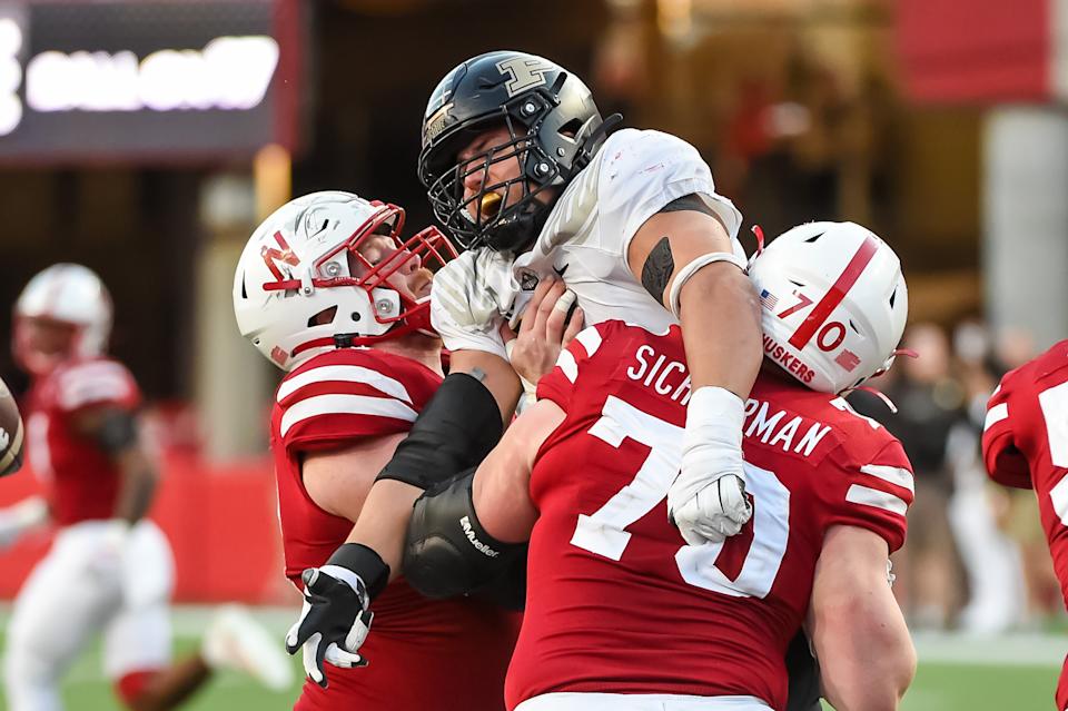 Offensive lines, like Nebraska's pictured in October of 2021, had to pay close attention to Purdue's George Karlaftis. (Photo by Steven Branscombe/Getty Images)