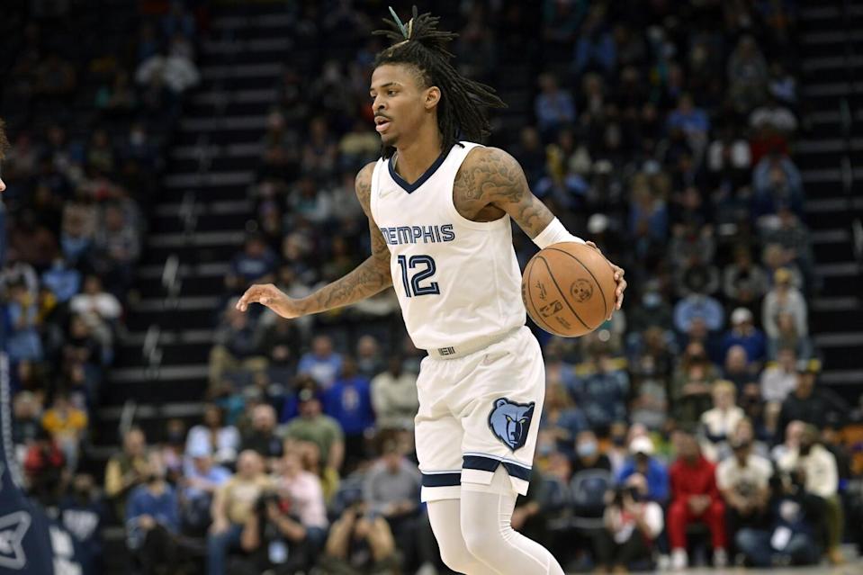 Memphis Grizzlies guard Ja Morant handles the ball against the Portland Trail Blazers on Feb. 16.