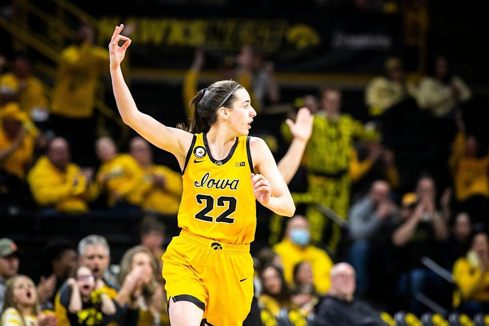 Iowa guard Caitlin Clark (22) reacts after making a 3-point basket during a NCAA Big Ten Conference women's basketball game against Ohio State, Monday, Jan. 31, 2022, at Carver-Hawkeye Arena in Iowa City, Iowa. 220131 Ohio St Iowa Wbb 008 Jpg