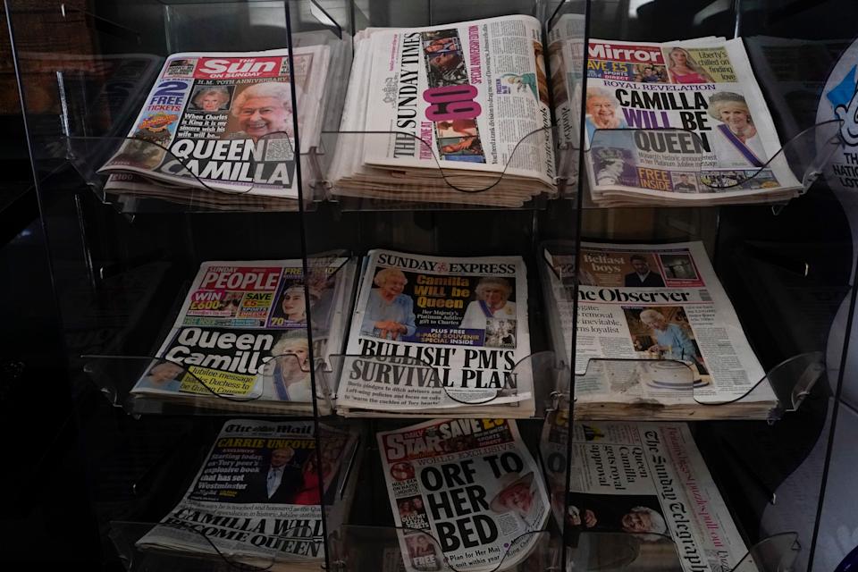 Front pages at a newsagent reporting the news that on the eve of her Platinum Jubilee Britain's Queen Elizabeth wants Camilla, Duchess of Cornwall, to be known as Queen Consort when Prince Charles becomes King, in London, Feb. 6, 2022.