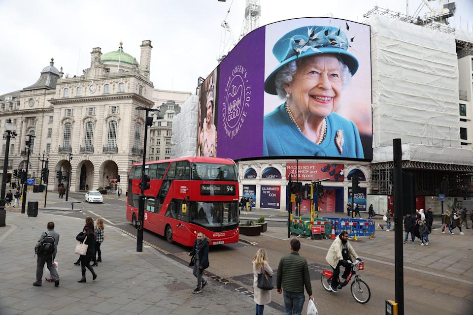 A portrait of Queen Elizabeth II is displayed on the large screen at Piccadilly Circus to mark the start of the Platinum Jubilee on Feb. 6, 2022 in London.