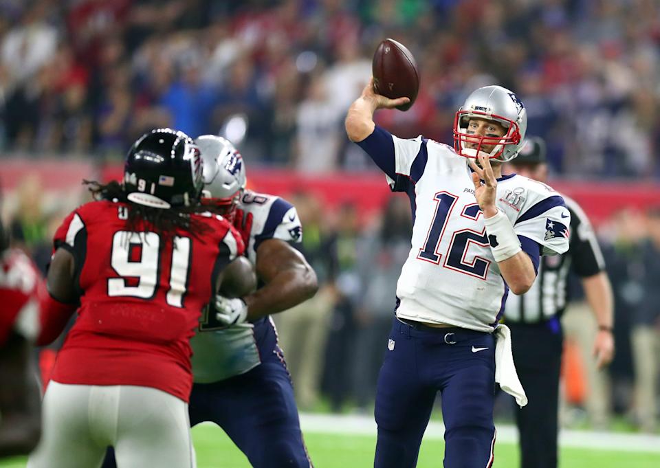 New England Patriots quarterback Tom Brady (12) throws a pass against the Atlanta Falcons in overtime during Super Bowl LI at NRG Stadium.