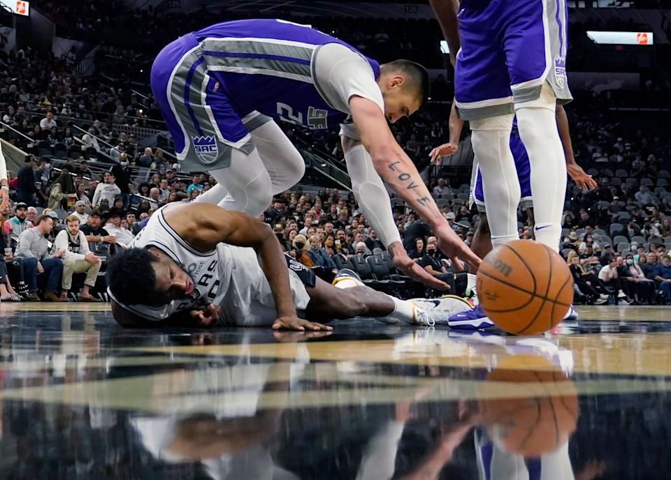 San Antonio Spurs forward Thaddeus Young, bottom, has been linked to the Phoenix Suns in a lot of NBA trade speculation.