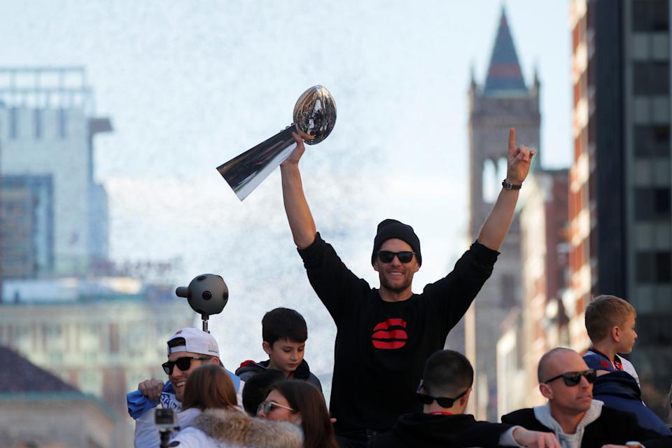 Tom Brady took former Michigan head coach Lloyd Carr's advice to heart, and it helped propel him to becoming the legend he is now. (REUTERS/Brian Snyder)