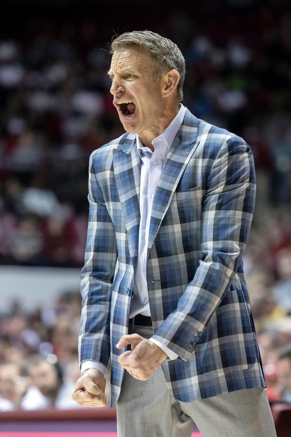 Alabama head coach Nate Oats screams at the referees during the first half of an NCAA college basketball game against Arkansas, Saturday, Feb. 12, 2022, in Tuscaloosa, Ala. (AP Photo/Vasha Hunt)