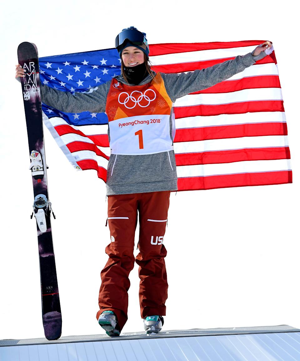 American Brita Sigourney celebrates winning bronze in the women's freestyle skiing halfpipe at the 2018 Olympics.