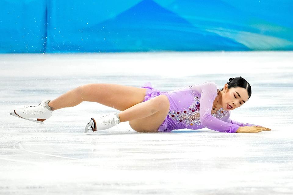 Karen Chen (USA) falls on ice in the women’s figure skating free program.