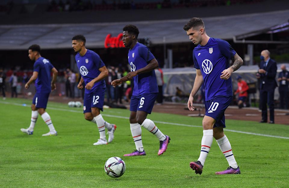 USMNT players warm up before the World Cup qualifier at Mexico.