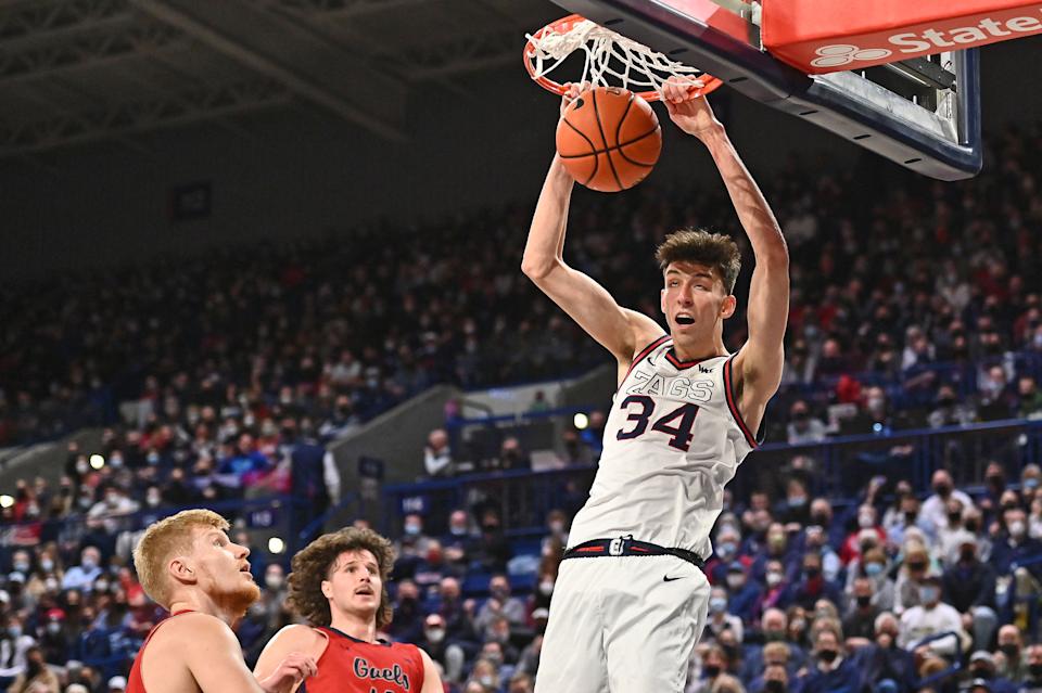 Feb 12, 2022; Spokane, Washington, USA; Gonzaga Bulldogs center Chet Holmgren (34) dunks the ball against the St. Mary's Gaels in the first half at McCarthey Athletic Center. Mandatory Credit: James Snook-USA TODAY Sports