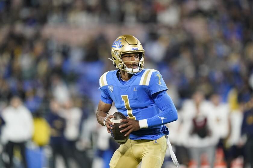 UCLA quarterback Dorian Thompson-Robinson pulls back to throw a pass during the first half of a game against California